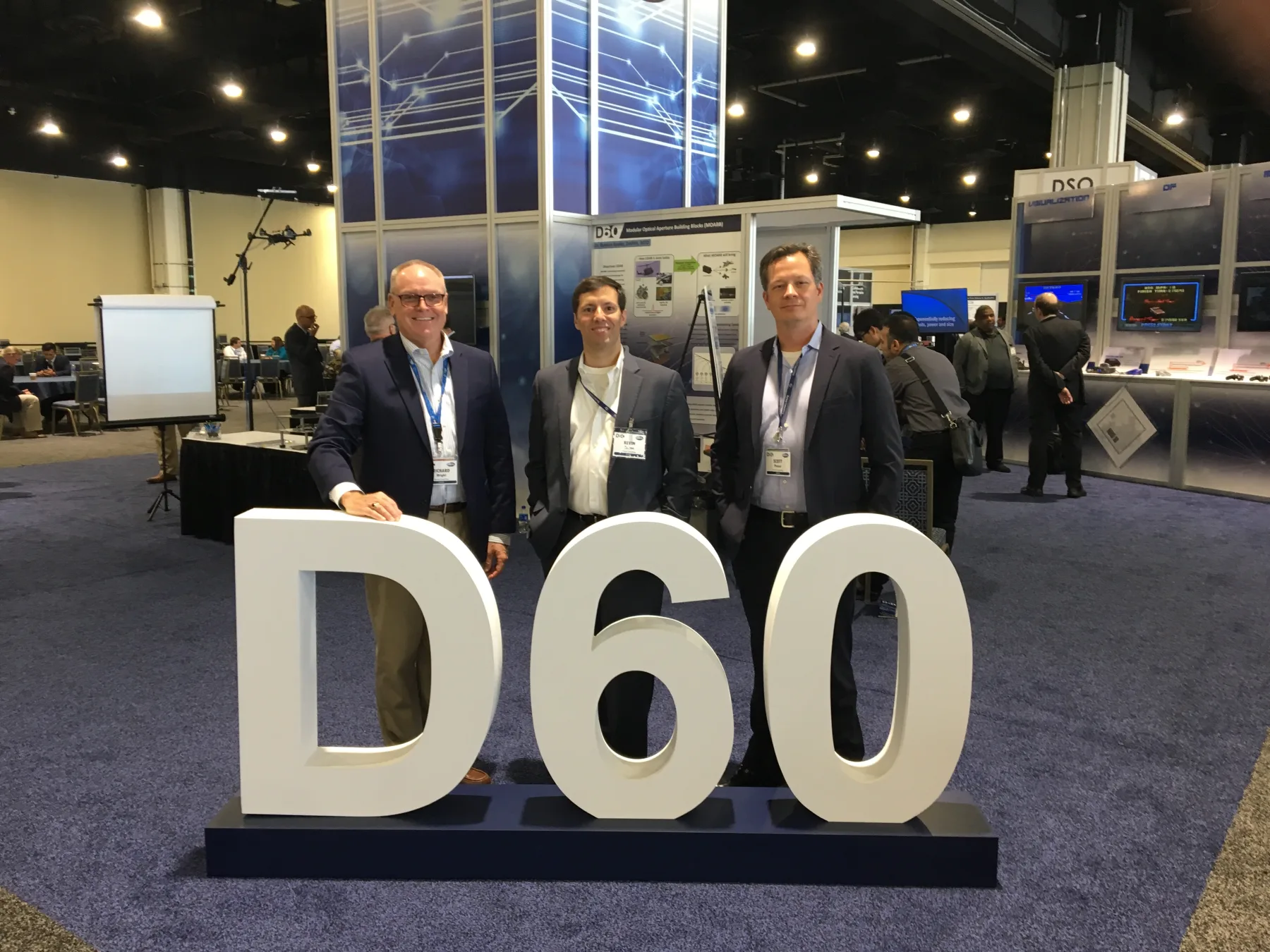 Barone team members representing the company at a defense technology conference
